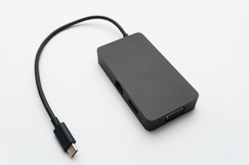 Best Devices for IPTV — Compact streaming hub with HDMI and USB connectors on a clean white background | OTT-TV