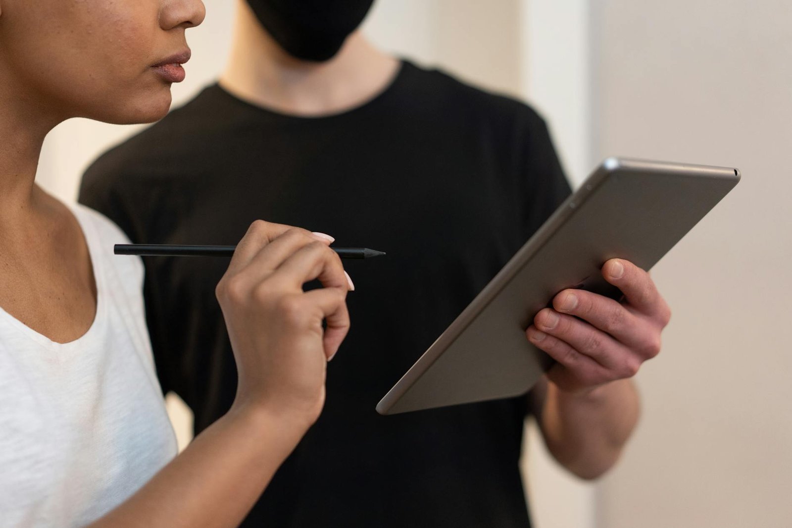 IPTV Free Trials — Two people interacting with a tablet during a sign-up flow | OTT-TV